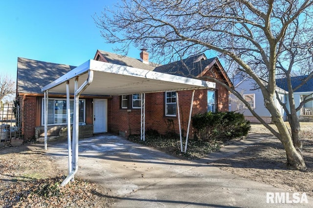 view of front of house with a carport