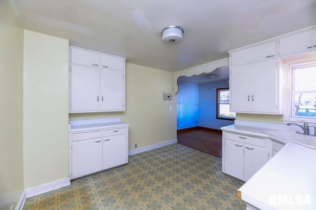 kitchen with sink and white cabinets