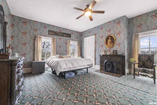 bedroom featuring carpet and ceiling fan