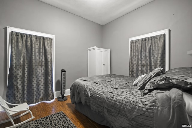 bedroom featuring dark hardwood / wood-style floors