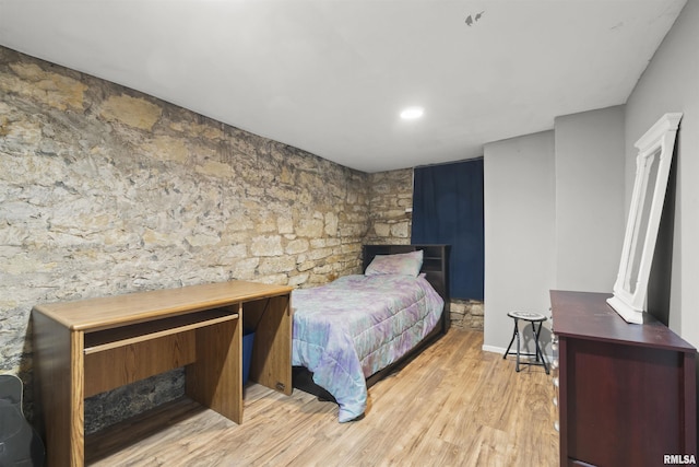 bedroom featuring light wood-type flooring