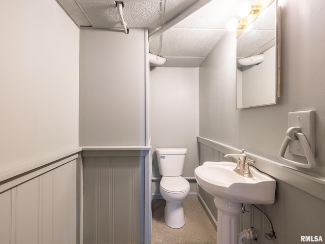 bathroom with sink and toilet