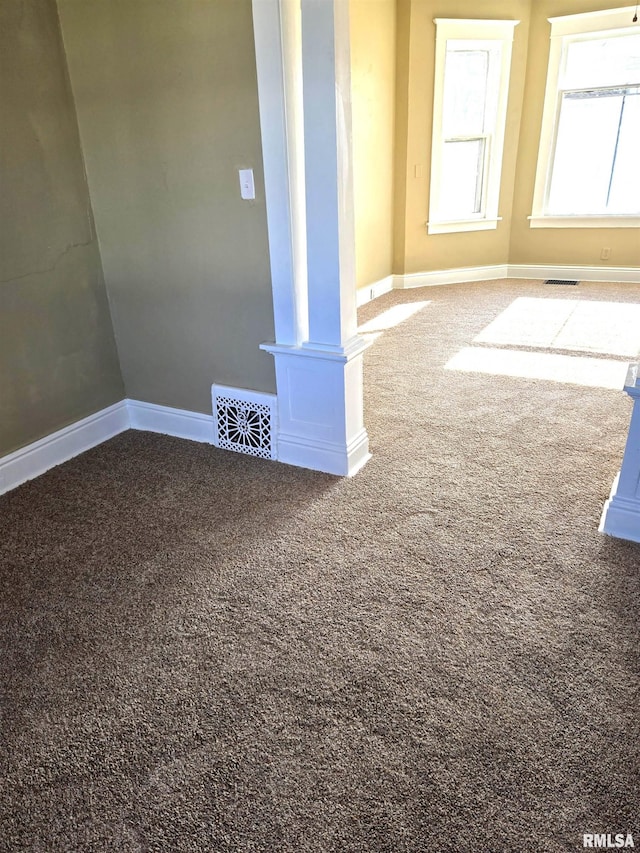 empty room with carpet flooring