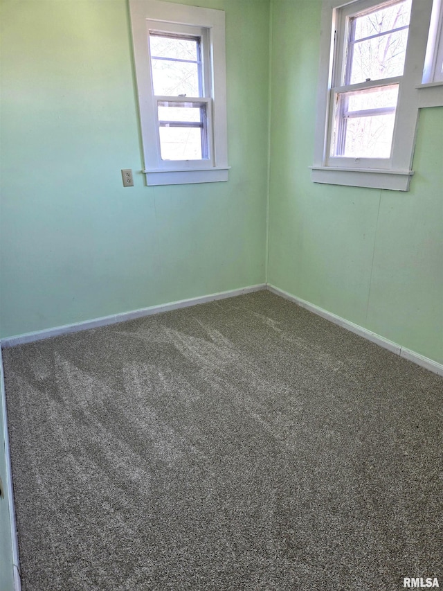 empty room with carpet flooring