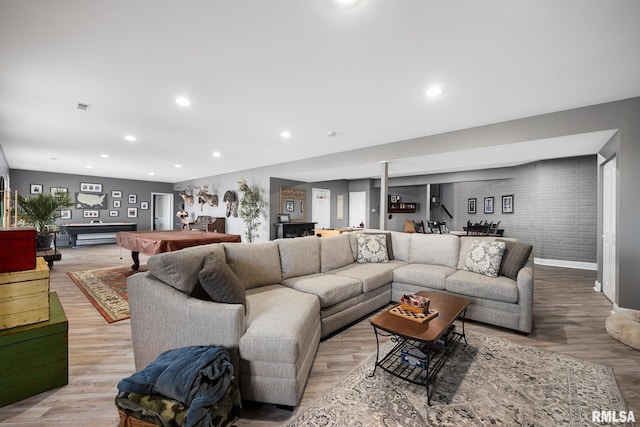 living room with recessed lighting, billiards, and light wood-style flooring