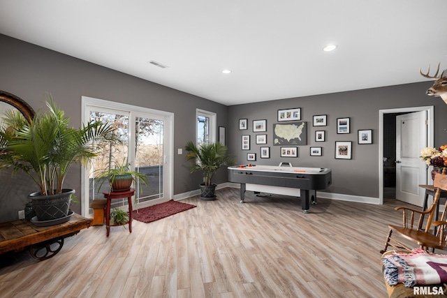 game room with baseboards, recessed lighting, visible vents, and light wood-style floors