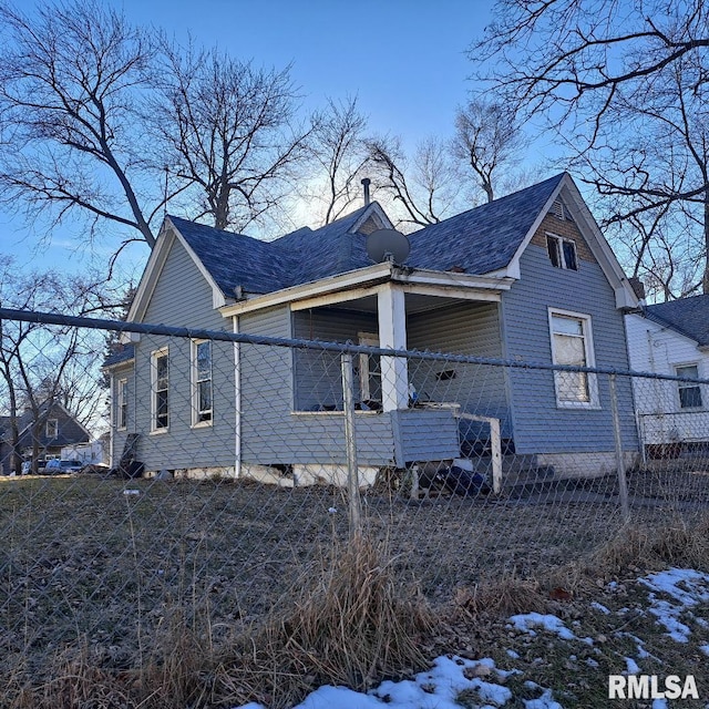 view of snow covered property