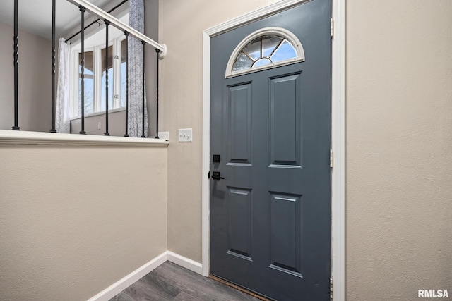 interior space with dark hardwood / wood-style flooring