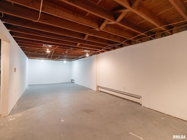 basement with a baseboard heating unit