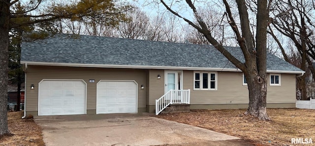 single story home with a garage