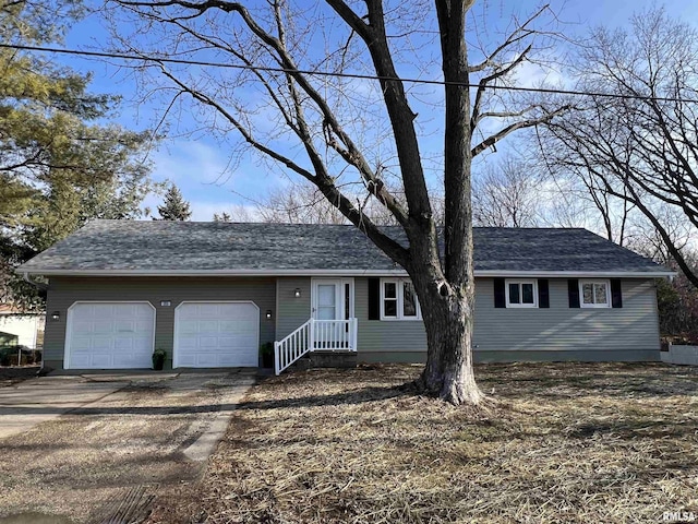 single story home with a garage