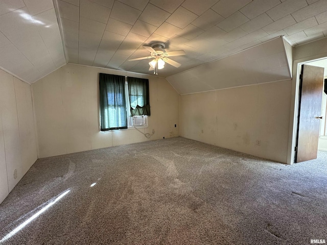 bonus room featuring lofted ceiling, cooling unit, ceiling fan, and carpet