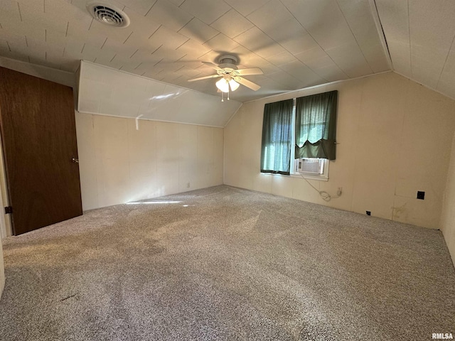 bonus room with cooling unit, ceiling fan, carpet flooring, and vaulted ceiling