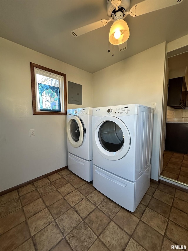 clothes washing area featuring washing machine and clothes dryer, ceiling fan, and electric panel