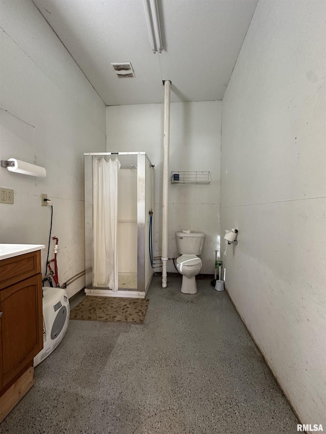 bathroom with vanity, toilet, and a shower with shower curtain