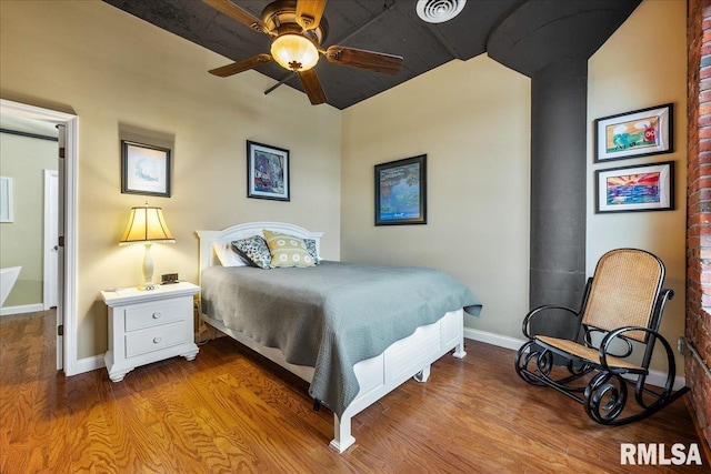 bedroom with ceiling fan and light hardwood / wood-style flooring