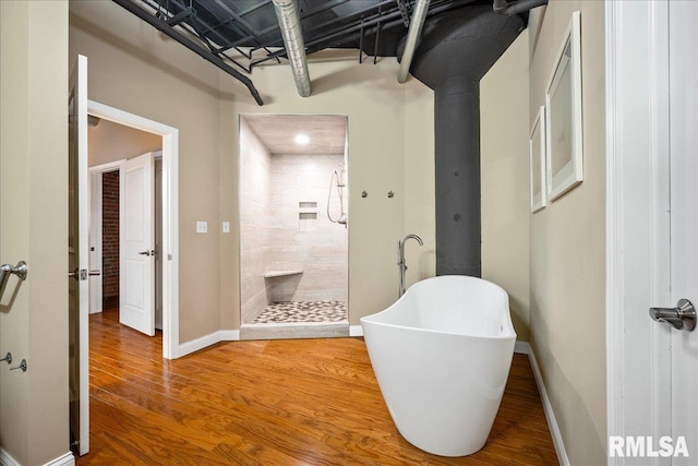 corridor featuring hardwood / wood-style flooring