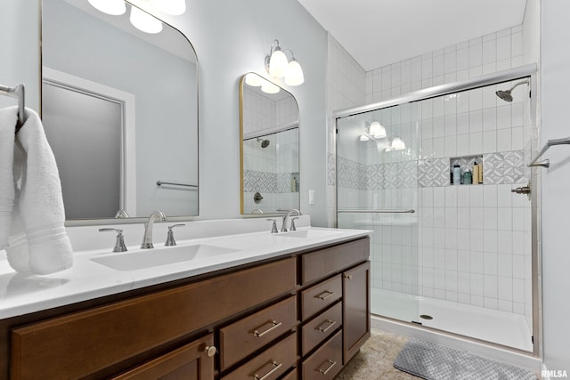 bathroom with vanity and an enclosed shower