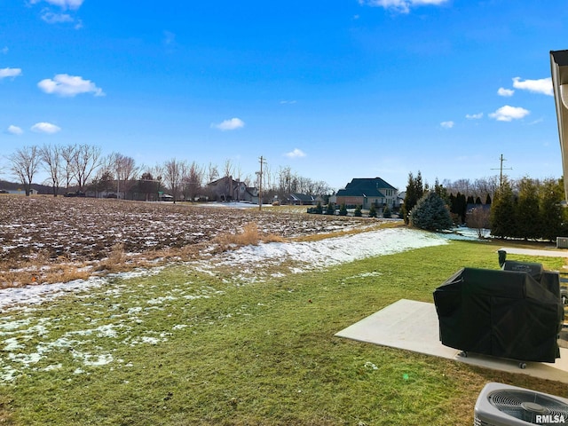 view of yard featuring central air condition unit