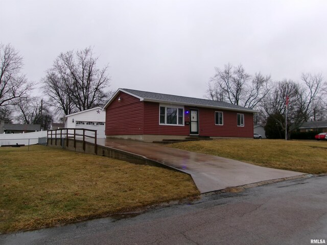 ranch-style home with a front lawn