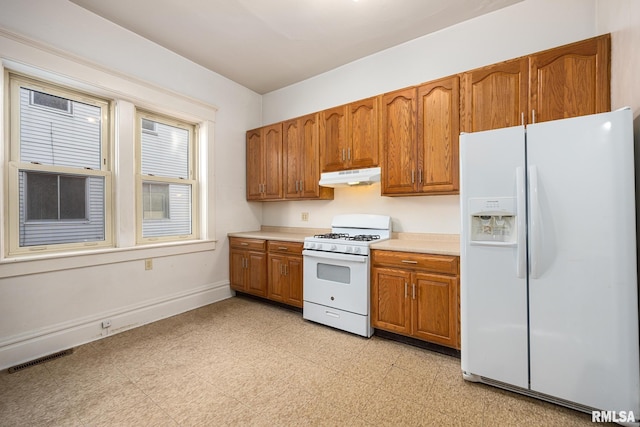 kitchen featuring white appliances