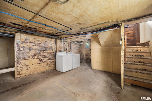 basement with separate washer and dryer