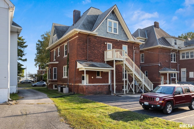 view of front of house featuring central AC