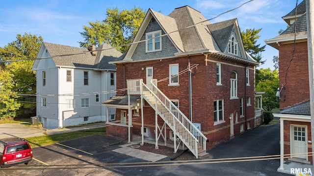 view of front of property with cooling unit