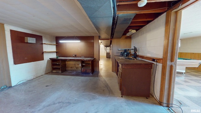 basement with a workshop area