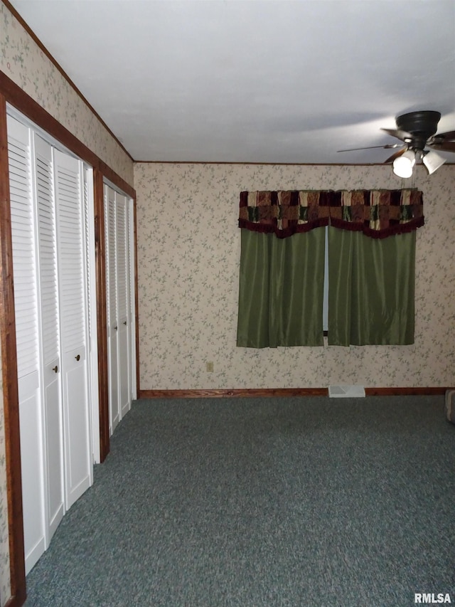 unfurnished bedroom with carpet floors