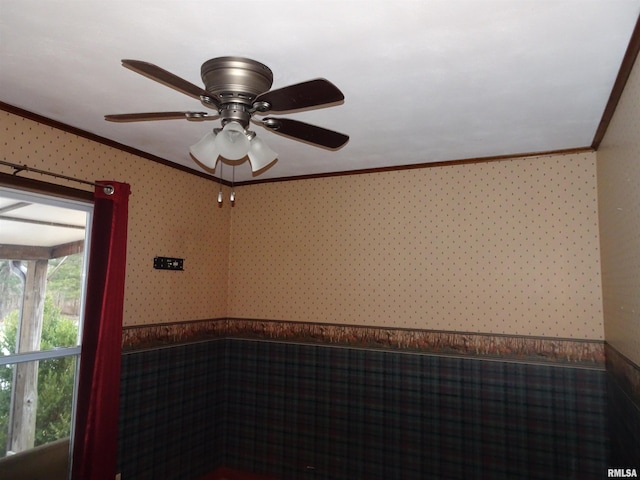 spare room with crown molding