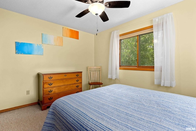 bedroom with carpet floors and ceiling fan