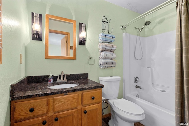 full bathroom with vanity, toilet, and shower / bath combo with shower curtain