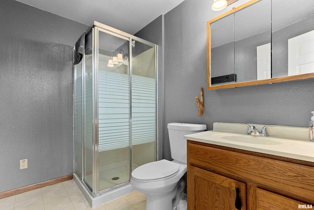 bathroom with vanity, toilet, and walk in shower