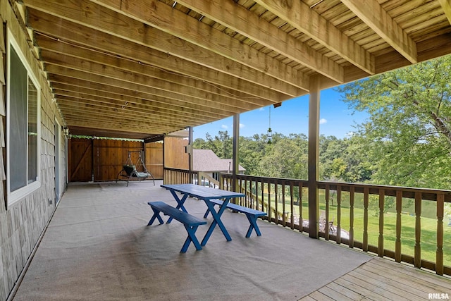 exterior space featuring a wooden deck