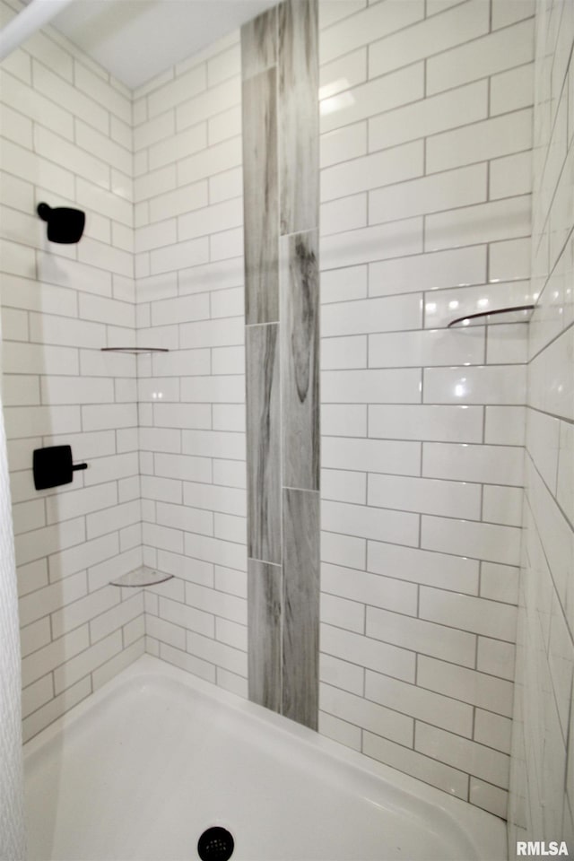 bathroom featuring walk in shower