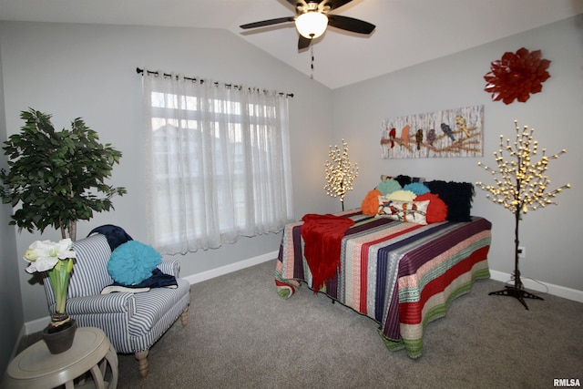 carpeted bedroom with ceiling fan and vaulted ceiling