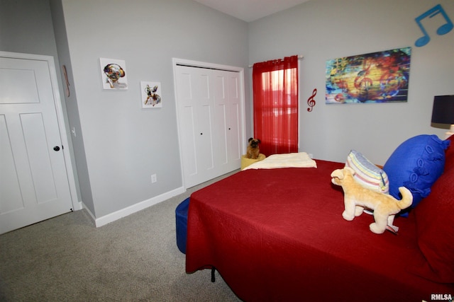 carpeted bedroom with a closet