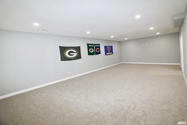 basement with carpet flooring