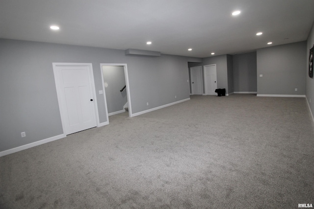 interior space featuring light colored carpet