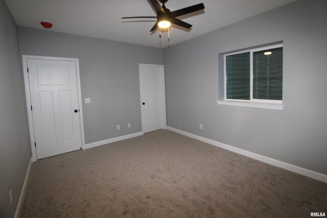 unfurnished bedroom with carpet flooring