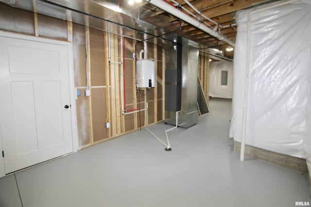 basement with heating unit and tankless water heater