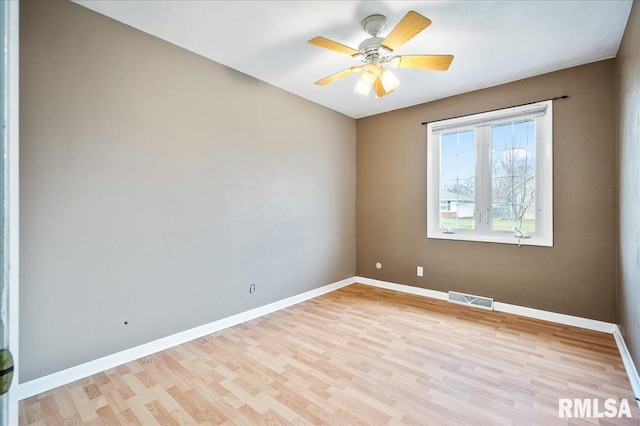 unfurnished room with ceiling fan and light hardwood / wood-style floors