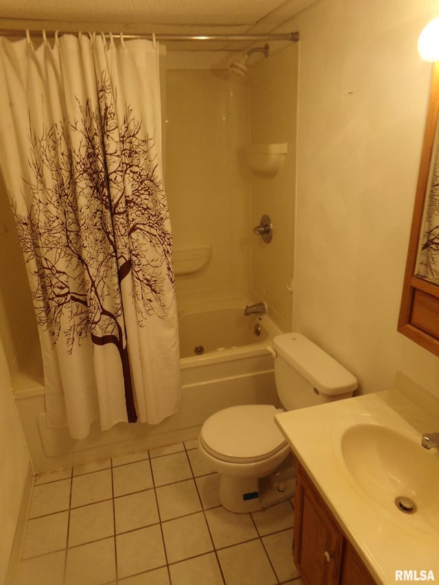 full bathroom featuring tile patterned flooring, vanity, toilet, and shower / tub combo with curtain