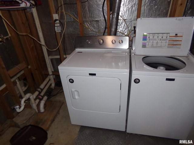 laundry area with washing machine and dryer