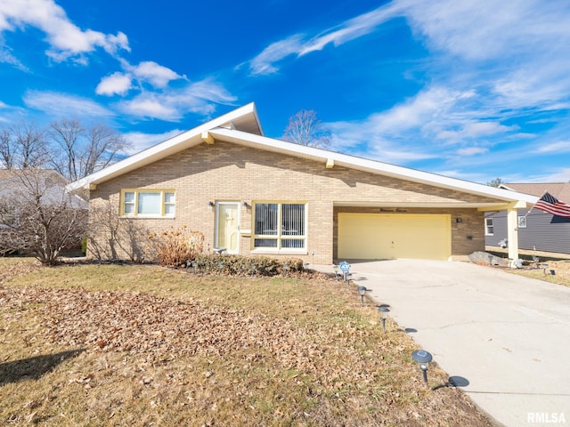 ranch-style house featuring a garage and a front yard