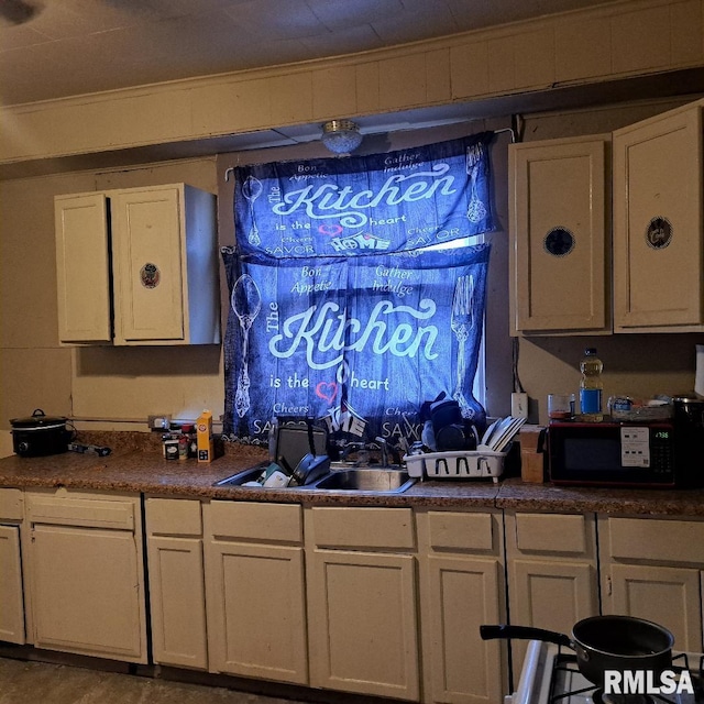 kitchen with sink and white cabinets