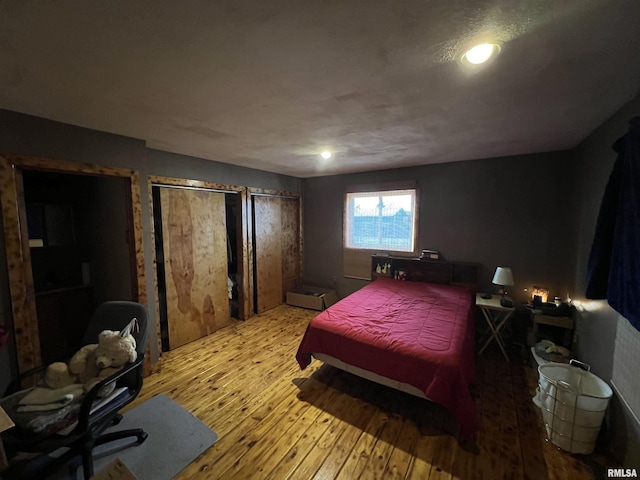 bedroom featuring light hardwood / wood-style floors