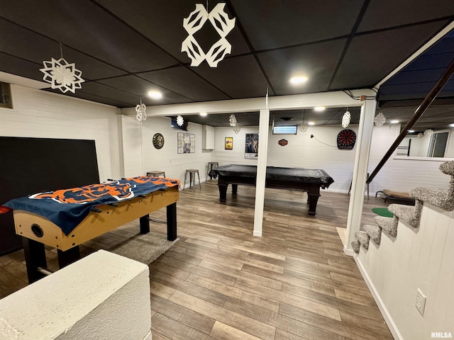 recreation room with hardwood / wood-style floors and pool table