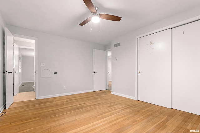 unfurnished bedroom with a closet, ceiling fan, and light hardwood / wood-style flooring